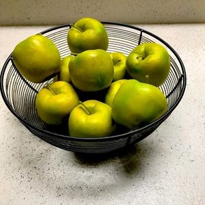 Wire basket with apples